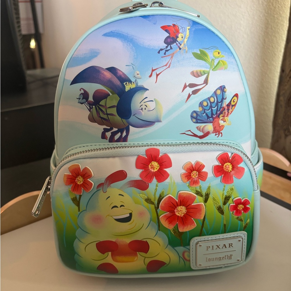 Loungefly Pixar Backpack - Blue and Red Bug's Life